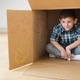 Image for article titled Sitting Inside Cardboard Box The Safest 6-Year-Old Will Feel For Remainder Of Life
